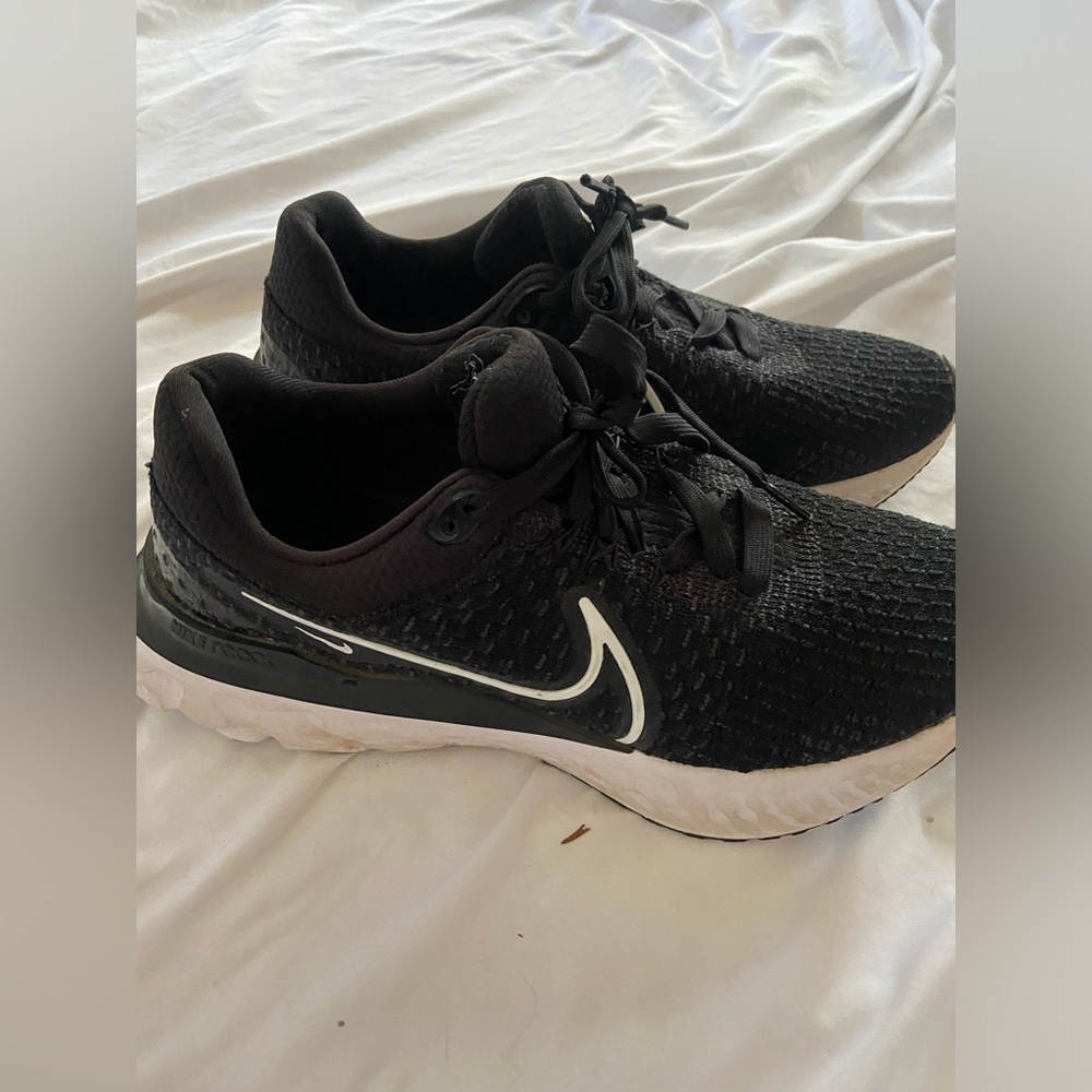 Nike black and white running shoes Women size 9.5